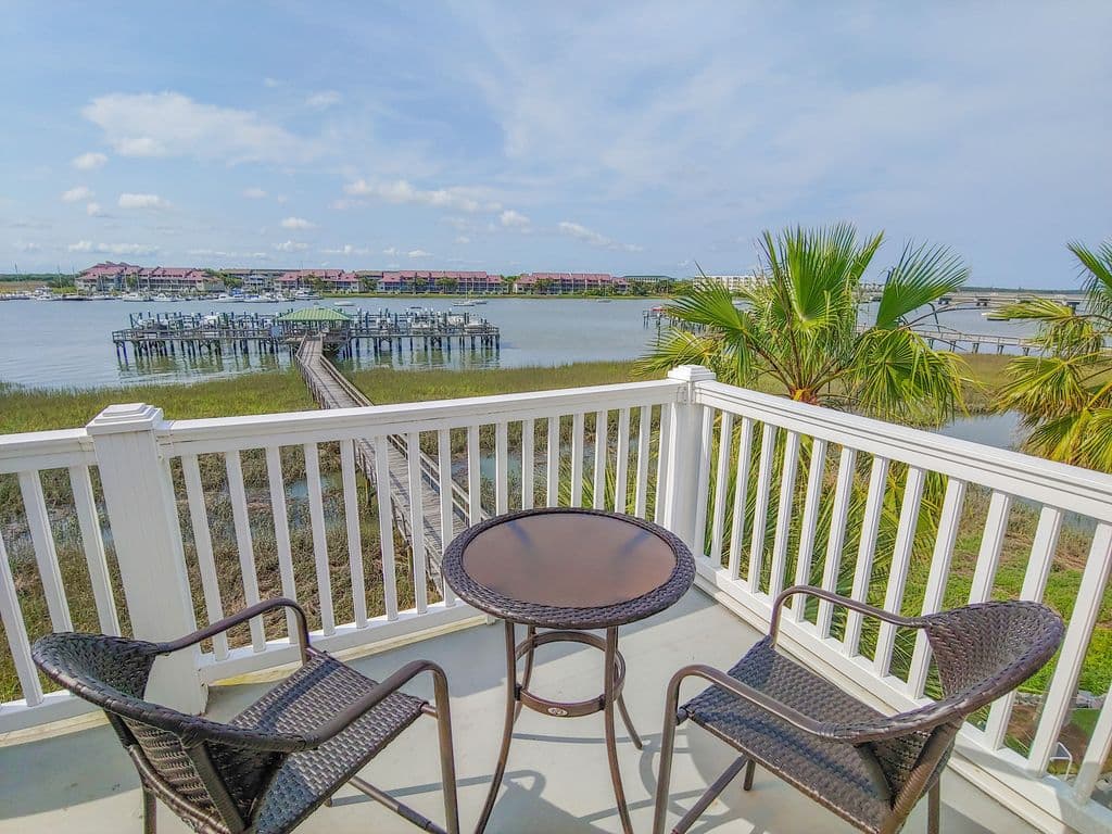Deck with river view and seating