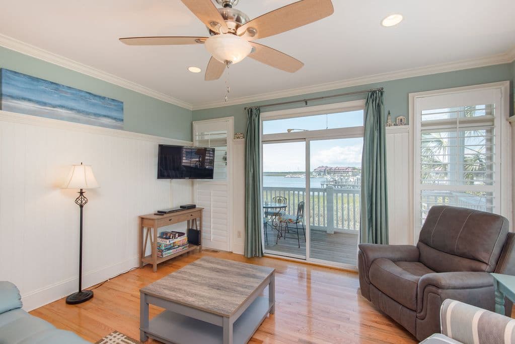 Family room with river view and deck access